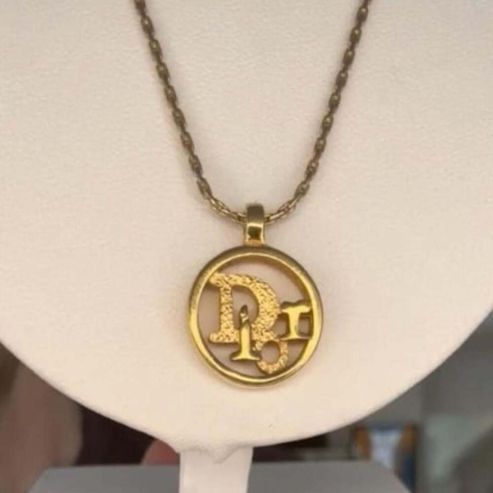 Christian Dior Vintage Gold Logo Circle Pendant Necklace